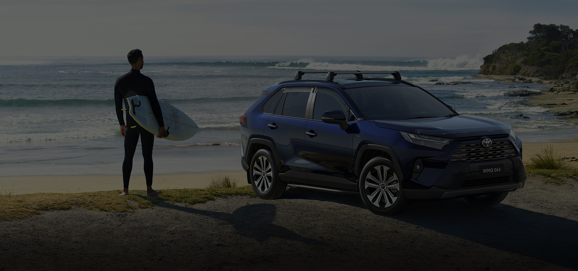 Toyota vehicle by the coast, representing Toyota Finance dealer network incentive growth.
