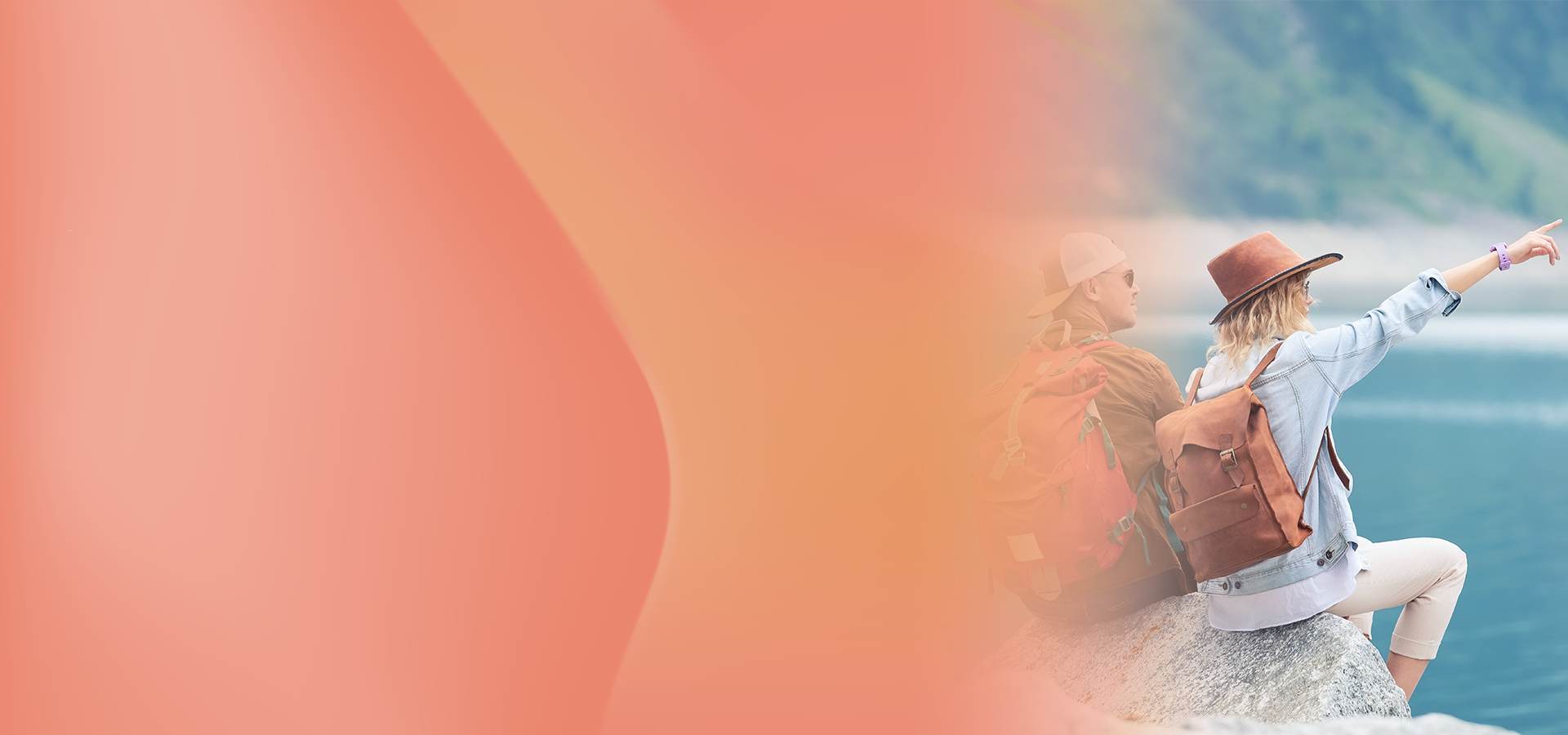 Travellers looking across a mountain lake representing incentive travel rewards.
